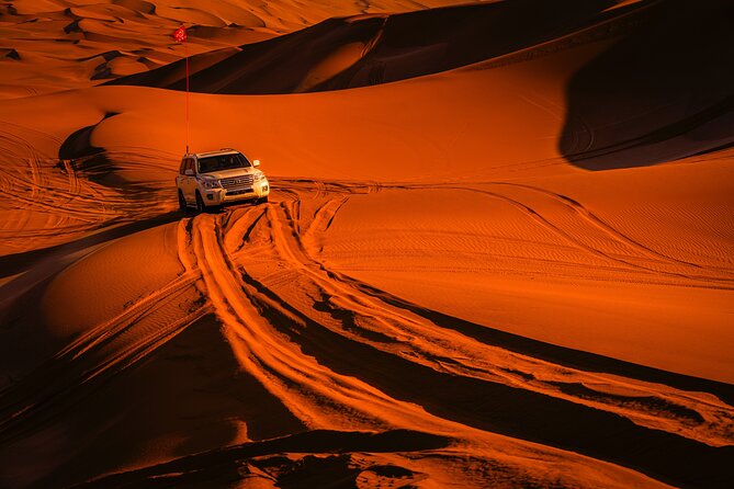 Doha Desert Safari Dune bashing,Sandboarding,CamelRide,Inland Sea - Sandboarding adds a simple second activity
