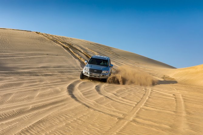 Doha Desert Safari: Dunebashing, Camel, Sandboarding & Inland Sea - What the $65.70 price really covers