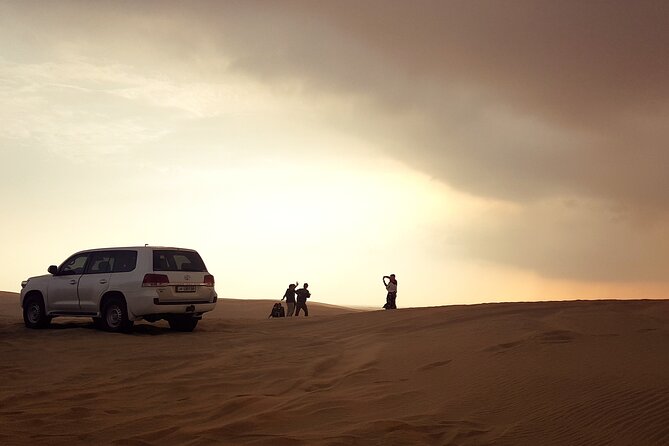 Doha: Desert Safari With Quad bike ,Camel Ride And Sand Boarding - Sealine Beach, tea, toilets, and the camel stop