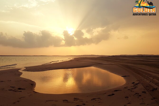 Doha: Desert Safari With Quad bike ,Camel Ride And Sand Boarding - Crossing the dunes to Khor Al Adaid