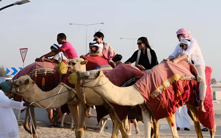 Doha: Desert Safari with Quad Bike, Sandboard & Camel Ride - Quad biking on marked desert tracks