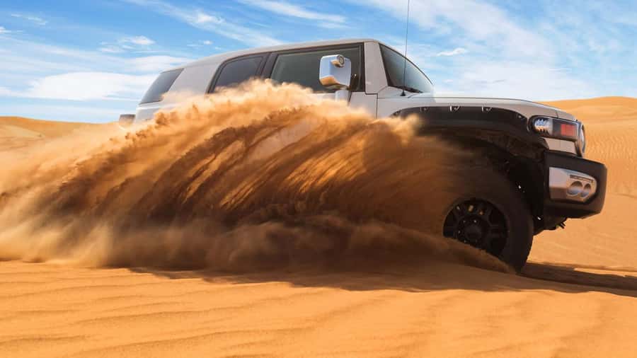 Doha: DesertSafari with Quad Bike, Camel Ride & Sandboarding - Camel riding brings a slower desert moment