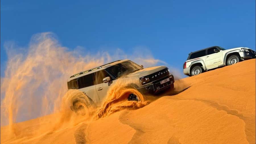 Doha: DesertSafari with Quad Bike, Camel Ride & Sandboarding - Sandboarding is simple, sandy, and fun