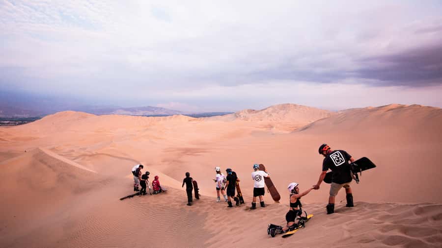 Doha: Dune Bashing Safari, Falcon, Camel, ATV, Sandboarding - Dune bashing in a professional 4WD