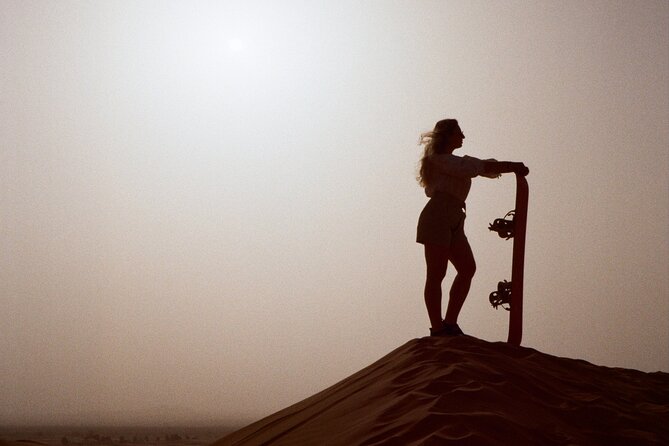 Doha Golden Dune Safari | Dune Bashing| Sandboarding| Inland sea - Sandboarding keeps you moving