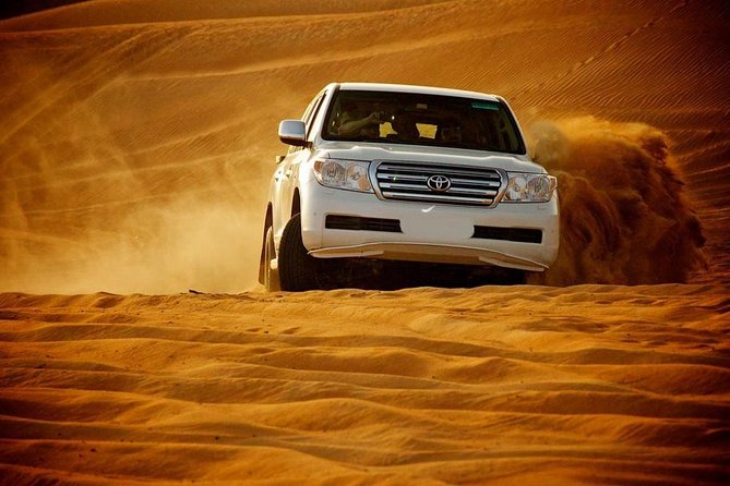 Doha :Half Day Desert Safari | Camel Riding | ATV | Sand Surfing - Sandboarding with the dunes under your feet