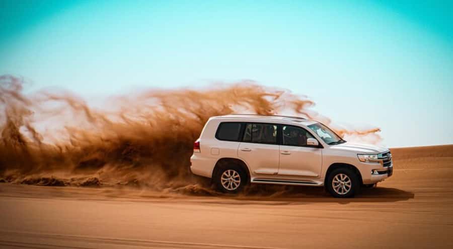 Doha: Half Day Desert Safari, Dune Bashing, Camel Ride - Leaving Doha for the Mesaieed dunes