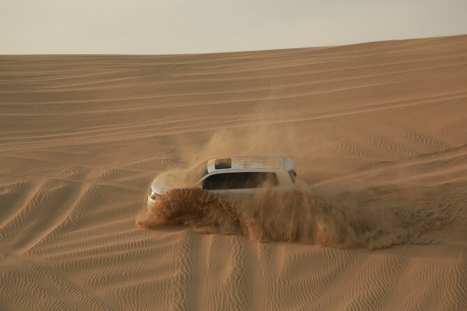 Doha: Half Day Desert Safari with Camel Ride and Inland Sea Tour - Sandboarding and the photo stop