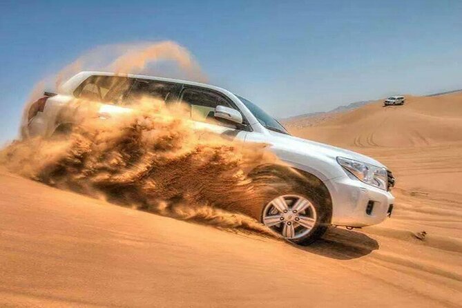 Doha Half Day Desert Safari with Camel Ride and Sand Boarding - Sandboarding is easy to try, even for beginners