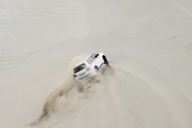 Doha-Half Day Safari with Quad Bike ATV/Camel Ride/sandboard - A 250cc ATV ride on a marked track