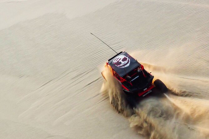 Doha-Half Day Safari with Quad Bike ATV/Camel Ride/sandboard - Dune bashing with a professional driver