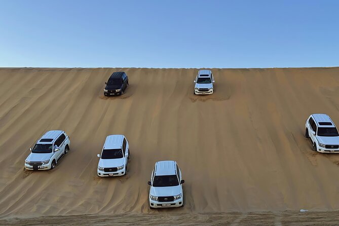 Doha: Luxury Desert Safari, Quad Bike & Sandboarding - Sealine Beach and the optional quad-bike stop