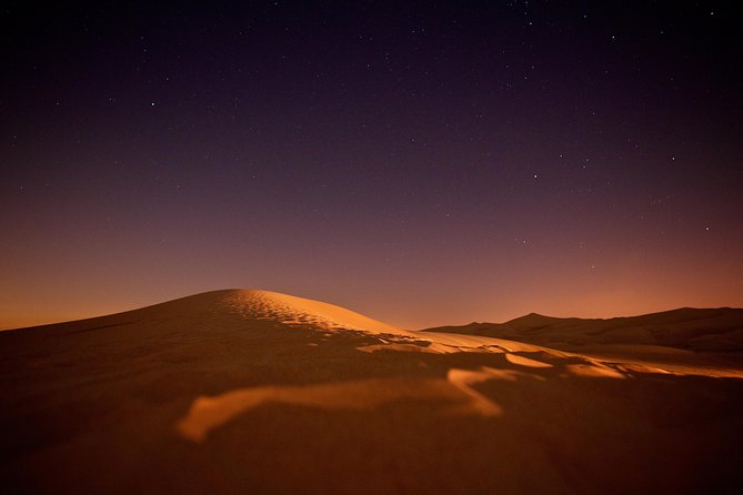Doha Night Desert Safari Camel Ride Dune Bashing with Transfer - The Inland Sea after dark