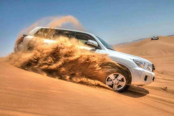 Doha : Night Desert Safari | Transit Safari | Camel ride | Dune Bashing - Sealine Beach: tea, camels, and tire preparation
