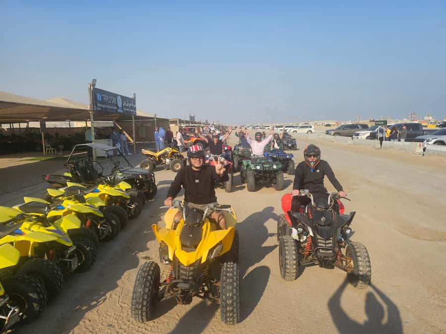 Doha: Quad Bike, Desert Safari, Buggy ride & inland sea tour - Camel ride and falcon photos