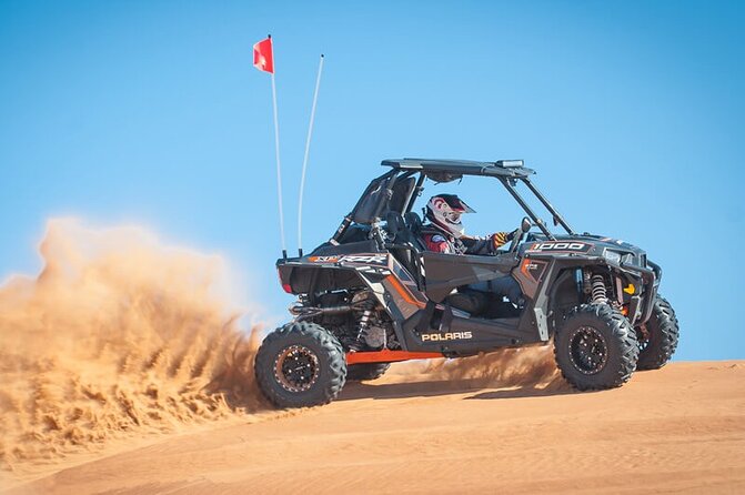Doha Safari Adventures, Dune Bashing, Sand Buggy, Camel Ride Tour - Sandboarding on Qatar’s dunes