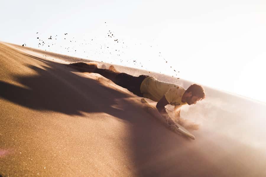 Doha:Safari Tour with Lunch/Dinner in Desert by the Sea Side - Sandboarding and camel riding add variety