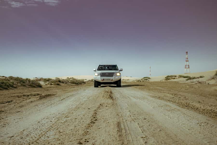 Doha: Sharing Desert Safari with Inland Sea visit - The long run toward Khor Al Adaid