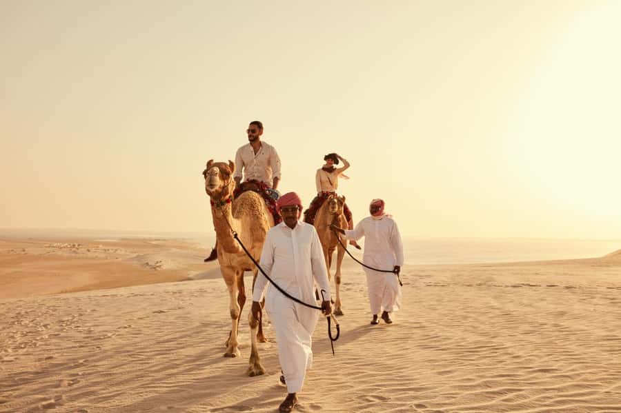 Doha:Sunrise or Sunset Desert Safari Tour with Sand Boarding - Dune bashing: thrilling, not merely scenic