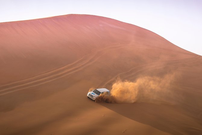 Doha: Sunset Desert Safari, Camels, Sandboarding & Inland Sea - Dune bashing: the tour’s loudest moment