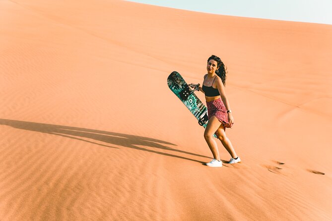 Doha: Sunset Desert Safari, Camels, Sandboarding & Inland Sea - Leaving Doha in an air-conditioned 4x4