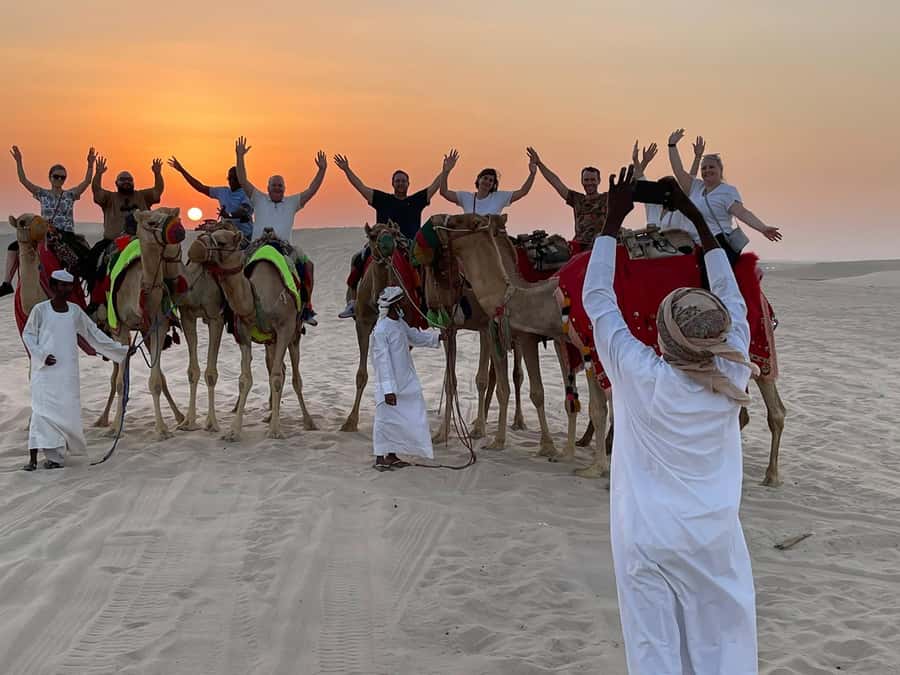 Doha: Sunset Safari, Dune Bashing, Sandboarding & Camel Ride - A four-hour desert trip with a clear focus