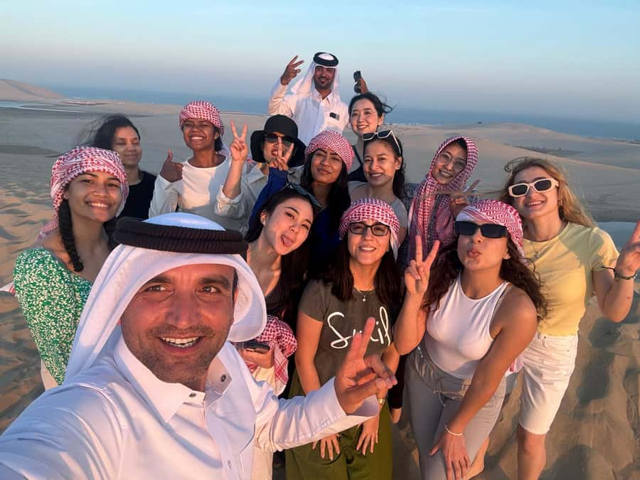 Doha: Sunset Safari, Dune Bashing, Sandboarding & Camel Ride - Pickup from Doha and the drive south