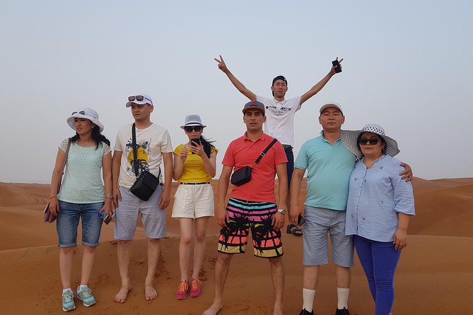 Dubai 4x4 Desert Safari, Quad Bike, Camel Ride & BBQ Dinner - Camel riding, coffee, dates, and henna