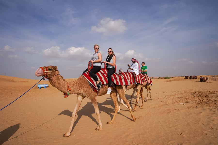 Dubai: Adventure Quad Bike Safari, Camel Ride & Refreshment - Sandboarding on the dune slopes