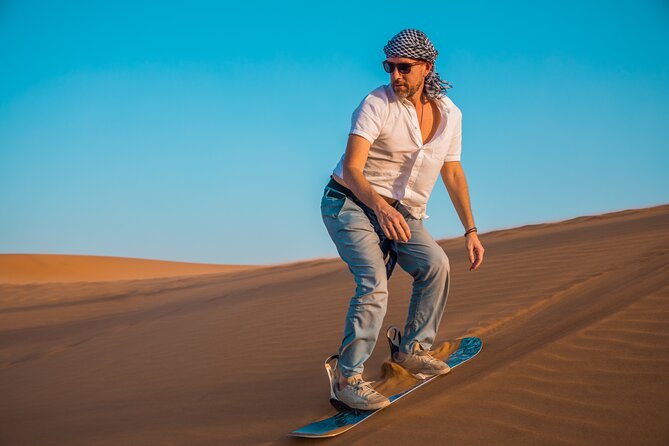 Dubai: Adventure Quad Bike Safari, Camel Ride & Refreshments - Leaving Dubai for the red dunes of Lahbab