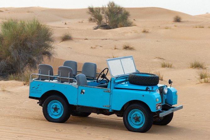 Dubai Camel Desert Safari, Traditional Meal & Heritage Activities - Entering the torch-lit Bedouin camp