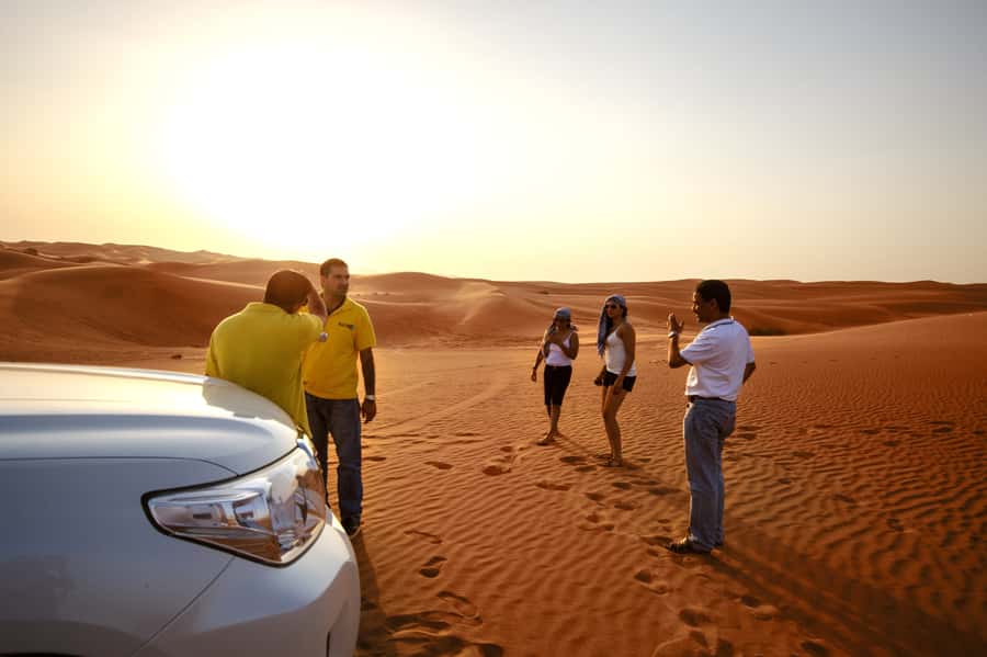 Dubai Cityscape and Desert Safari Full-Day Tour - Camel riding and sandboarding