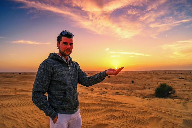 Dubai Desert Discovery: Red Dunes Safari, Sandboard & Camel Ride - Optional quad biking for a separate burst of speed