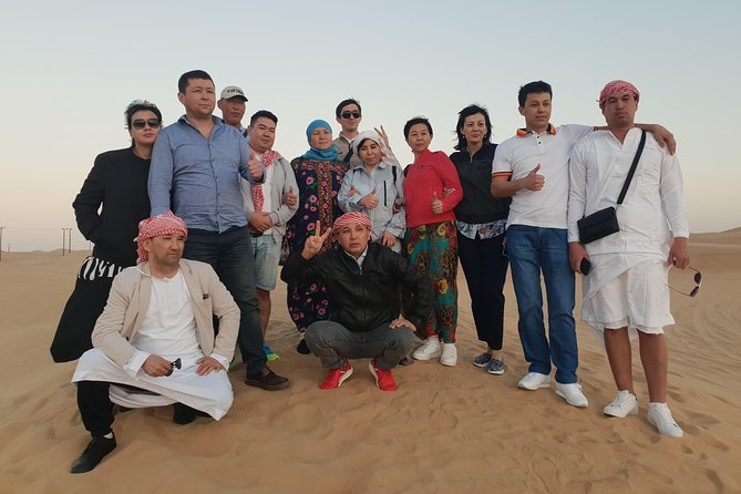 Dubai Desert Safari Adventure, 60mins ATV, Camel Ride, Shows, BBQ - Sunset, sandboarding, and the camel stop