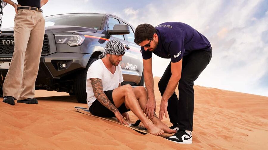 Dubai Desert Safari - Camel Ride, Sandboarding & 30 Min Quad - The highest dune and sandboarding stop