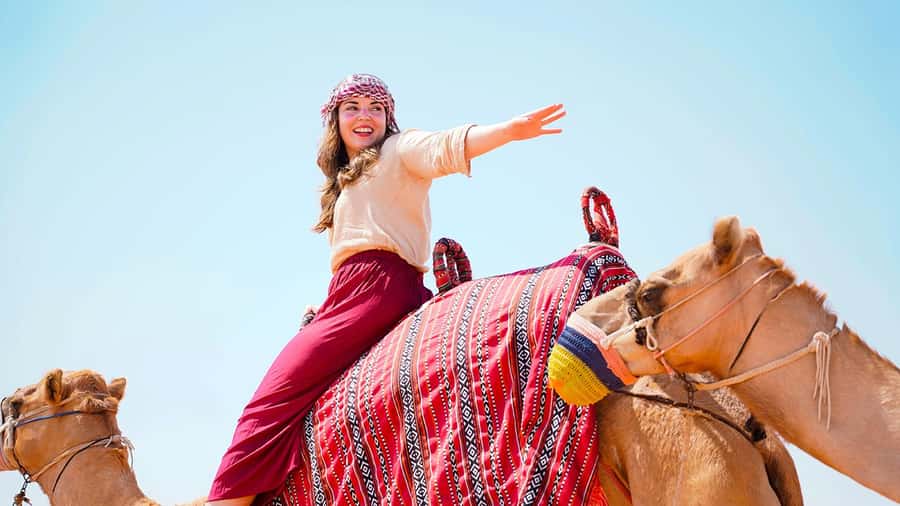 Dubai: Desert Safari, Camel Ride, Sandboarding, Quad Bike - Hotel pickup and the ride southeast from Dubai