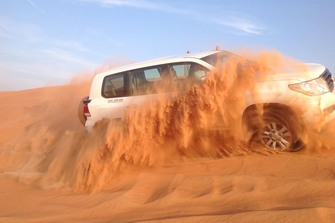 Dubai: Desert Safari, Camel Ride, Show & Optional Dinner - Sandboarding is short, simple, and surprisingly tiring