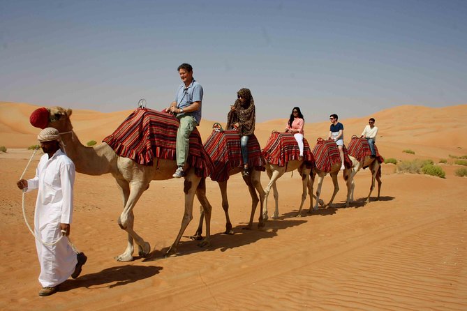 Dubai: Desert Safari, Camel Ride, Show & Optional Dinner - Sunset gives the evening trip its best moment