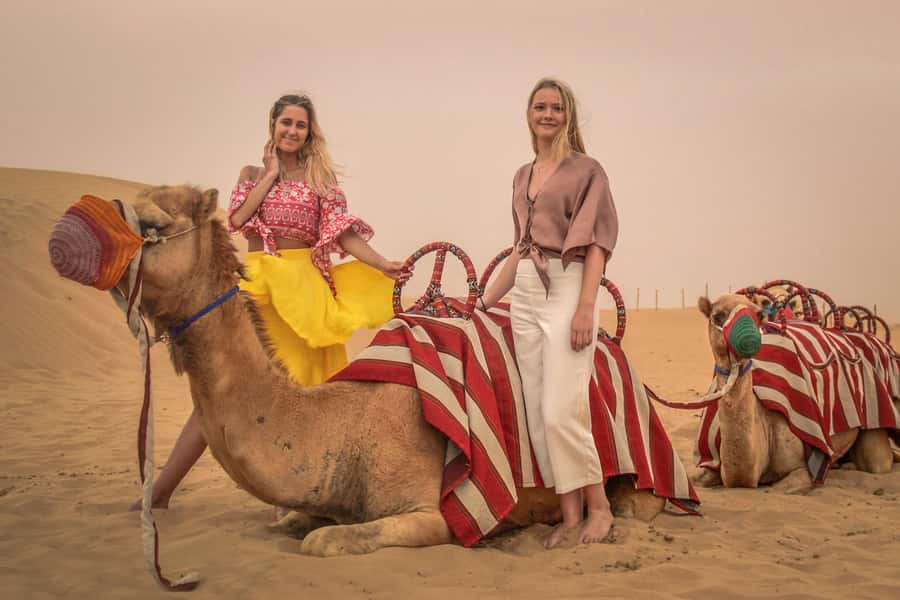 Dubai: Desert Safari, Quad Bike, Camel Ride & Al Khayma Camp - Red Dunes first, city streets behind you