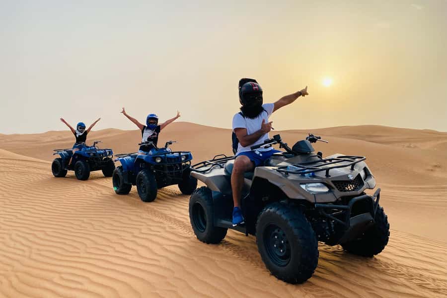Dubai: Desert Safari, Quad Bike, Camel Ride & Al Khayma Camp - Sandboarding on a red dune