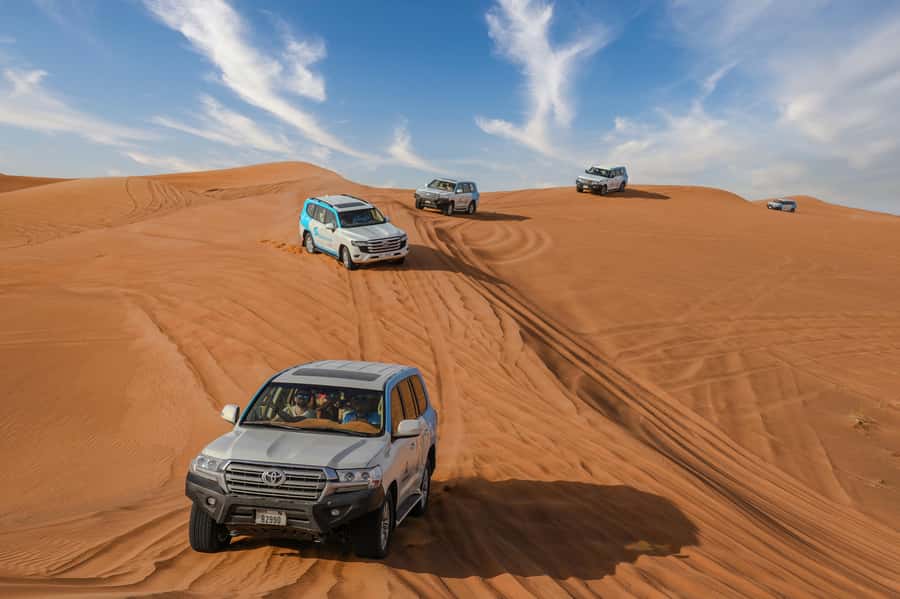 Dubai: Desert Safari, Quad Bike, Camel Ride & Al Khayma Camp - Al Khayma Camp adds the evening rhythm