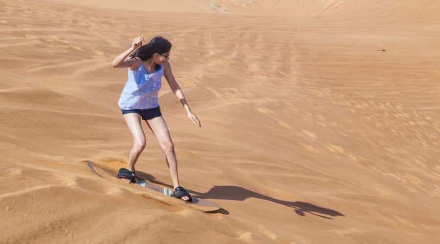 Dubai: Desert Safari, Quad Bike, Camel Ride and Sandboarding - From Dubai streets to Lahbab’s red dunes