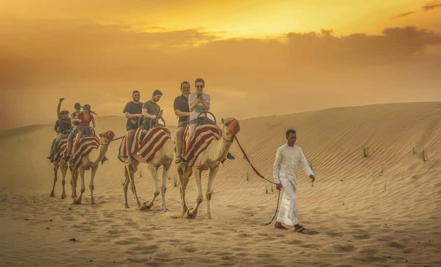 Dubai: Desert Safari, Quad Bike, Sandboarding, Camels & BBQ - Dune bashing across the Lehbab red dunes
