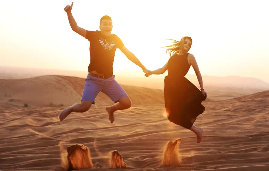 Dubai: Desert Safari, Quad Bike, Sandboarding, Camels & BBQ - BBQ dinner and evening shows at the shared camp