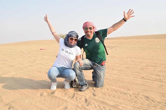 Dubai Desert Safari with BBQ, 3 Shows & Camel Ride at Majlis Camp - Henna, shisha, and Arabic clothing photos