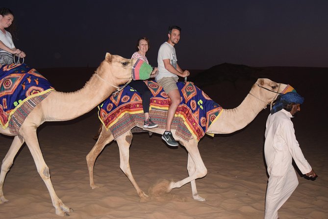 Dubai Desert Safari with BBQ, 3 Shows & Camel Ride at Majlis Camp - Three shows: belly dancing, tanoura, and fire