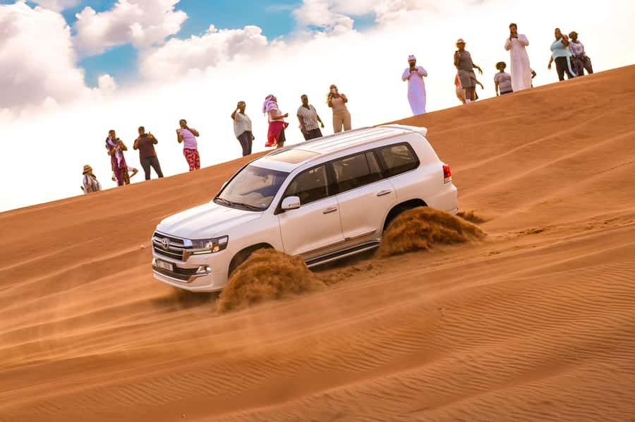 Dubai: Desert Safari with BBQ Dinner & Quad Biking Options - Dune bashing in a 4x4
