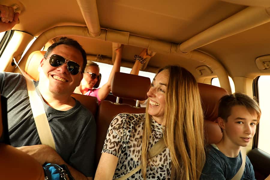 Dubai: Desert Safari with Camp, Dinner, & Optional Overnight - Dune bashing and sandboarding on the red sand