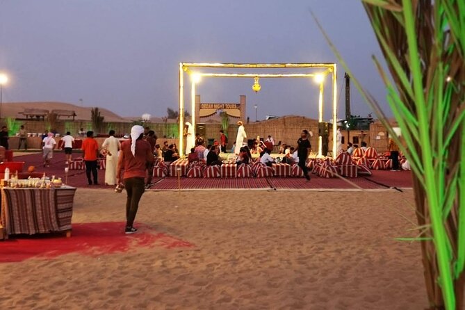 Dubai Desert Safari with Dune Bashing, Camel Ride, & BBQ Dinner - Camel riding and sandboarding, with realistic expectations