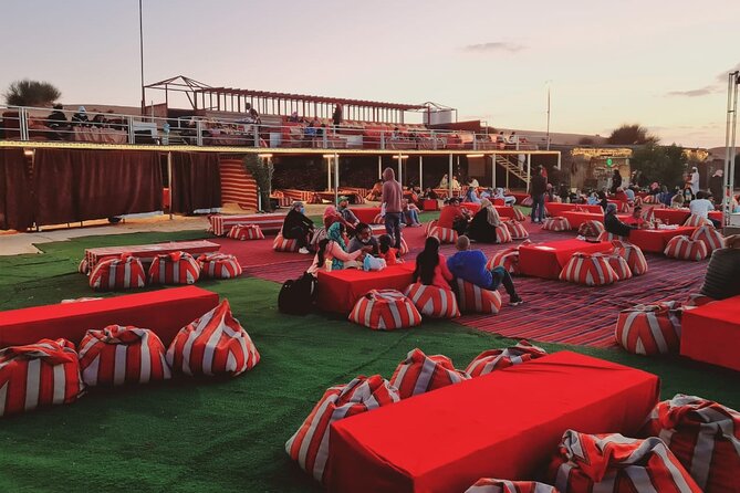 Dubai Desert Safari with Quad Bike, Camel Ride, Dinner and Show - Dinner, barbecue, and three live shows
